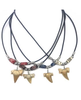 Shark tooth with carved beads on leather cord necklace