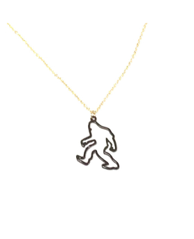 Brown cut out figure of Big Foot on a gold chain necklace