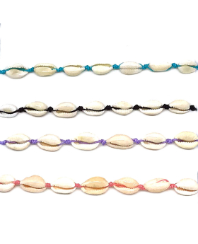 Assorted string bracelets with cowrie shells