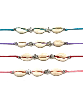 Assorted string bracelets with cowrie shells and small silver turtle beads