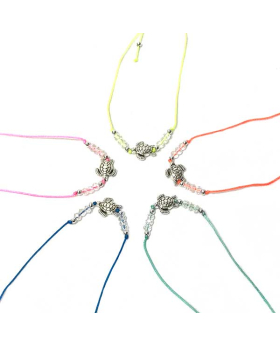 Turtle on assorted string with clear beads bracelet