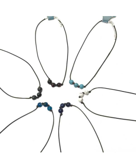 Assorted round stone beads on brown cord necklace