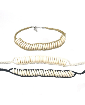 Side profile Cowrie shell choker on assorted linen cord